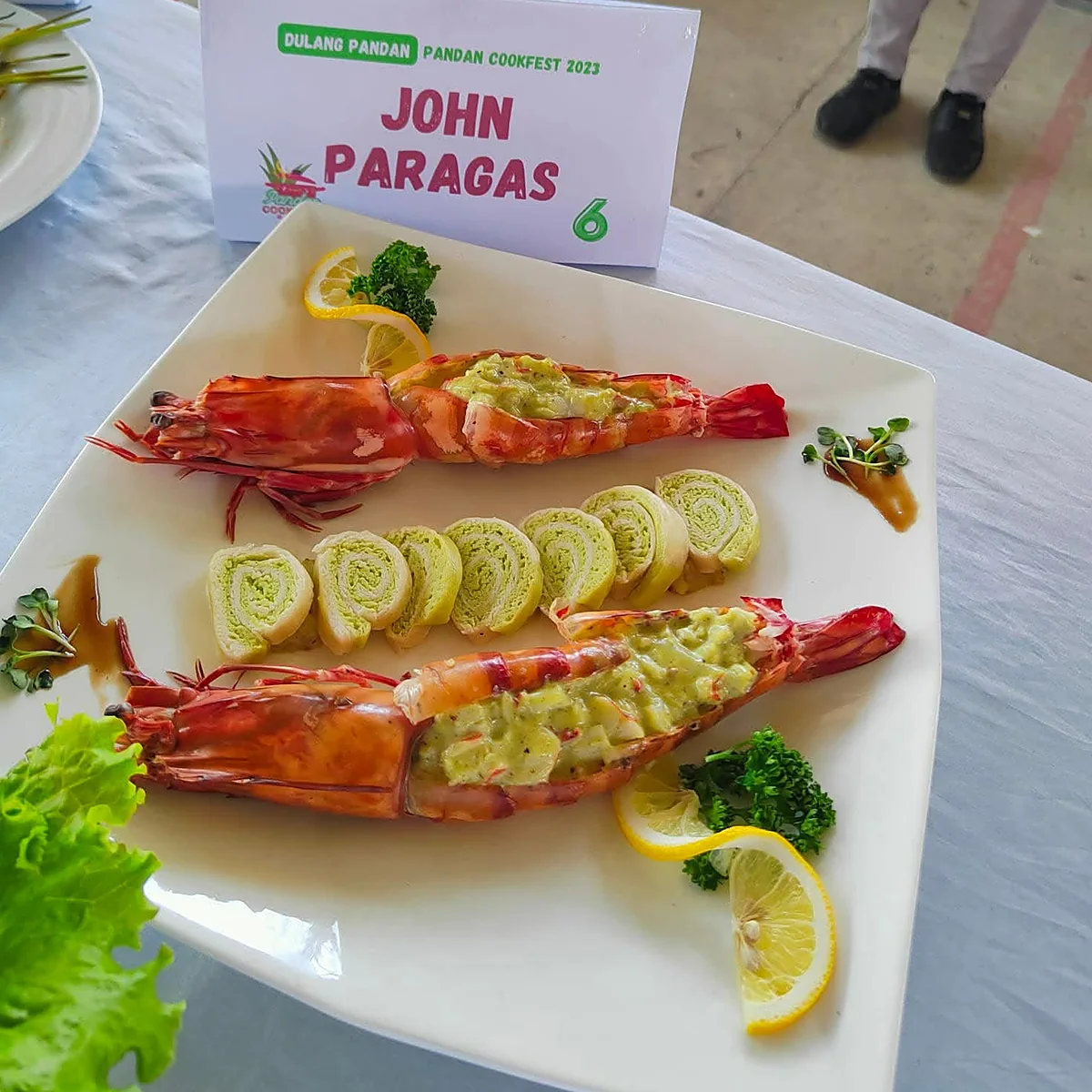 The winning competition plate — pandan butter prawns with pandan roulade