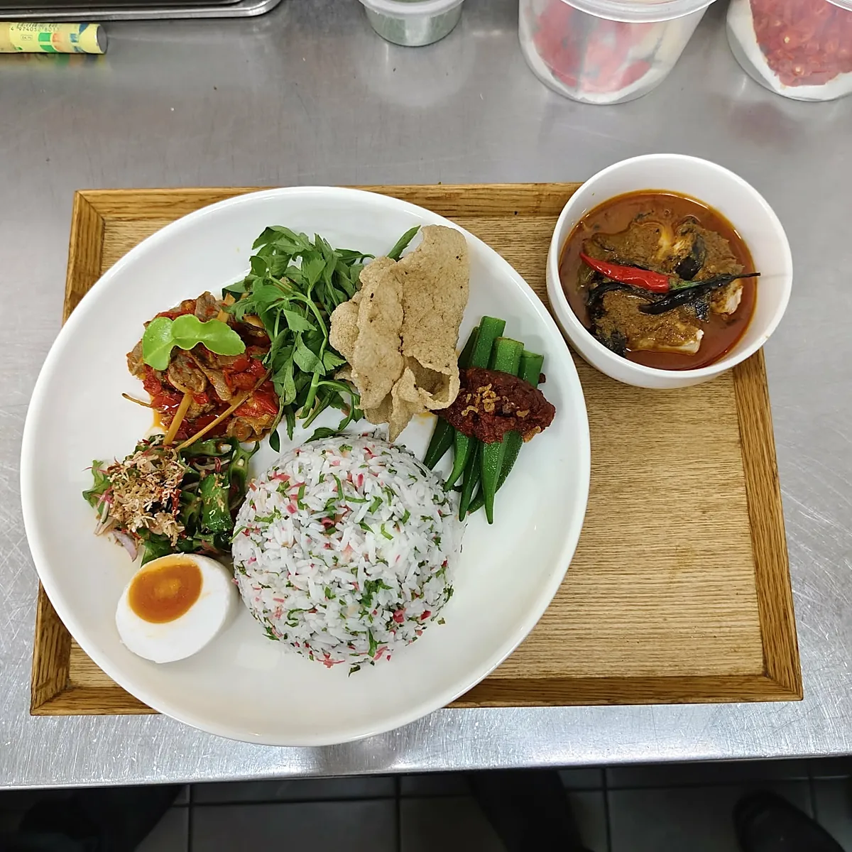 Nasi kerabu set with salted egg and curry