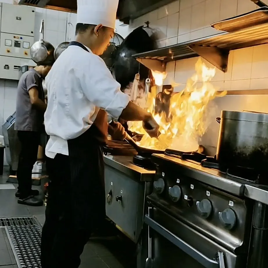 Chef John Paragas working the range
